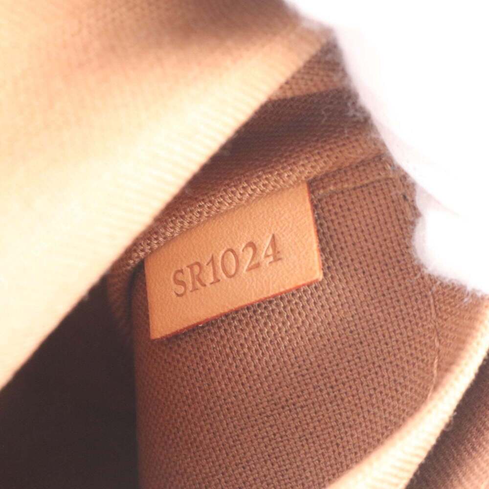 LOUIS VUITTON Brown Monogram Leather Backpack - Picture 10 of 10